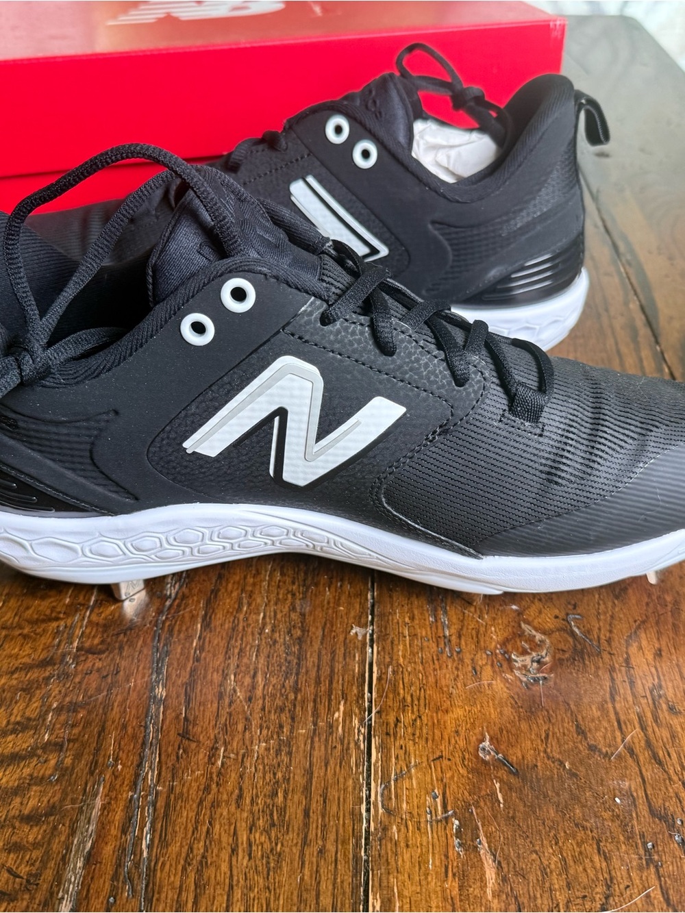 New Balance Fresh Foam Black and White Metal Cleats, 11.5